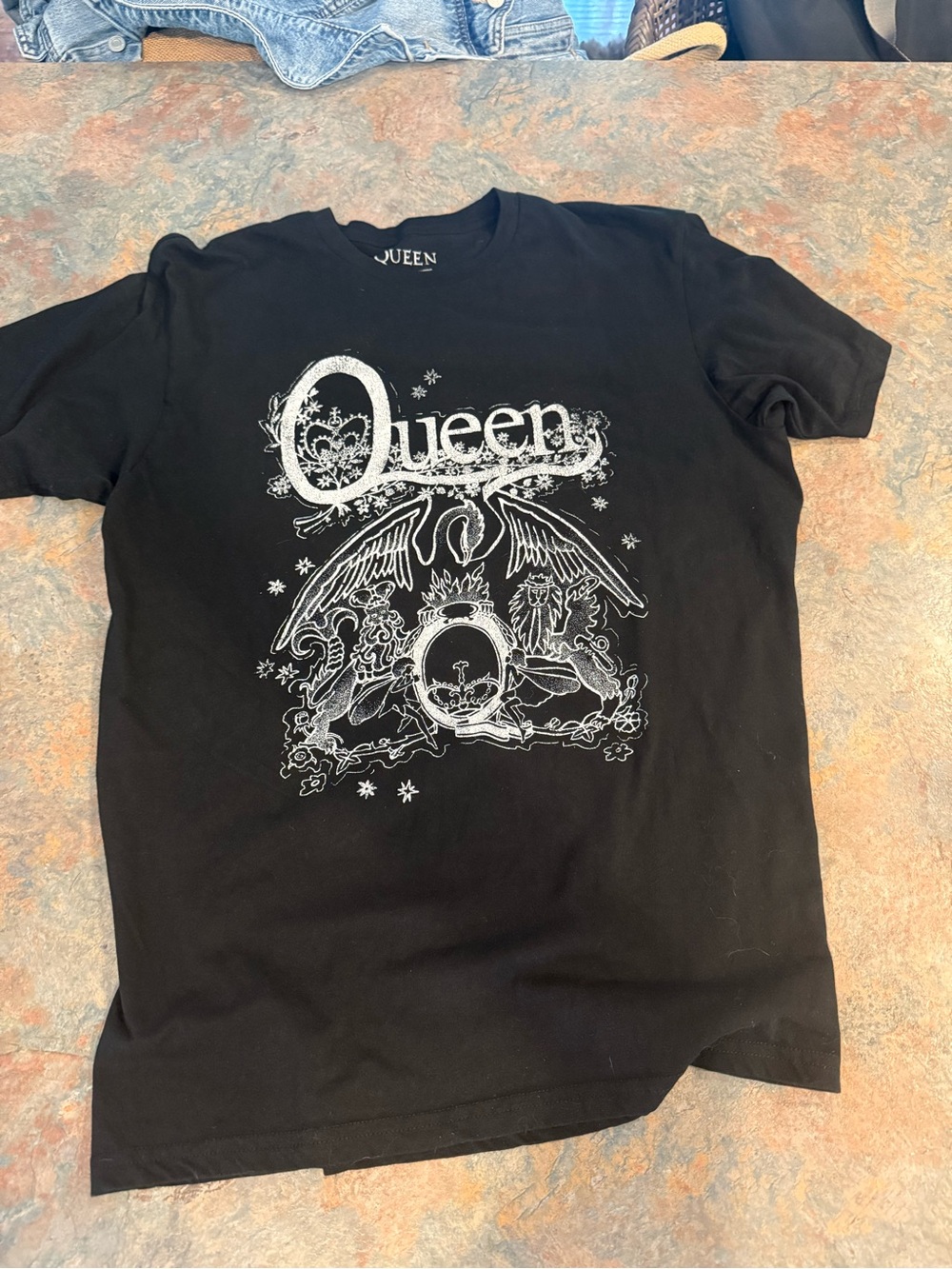Queen Black Band Graphic Tee with White Crest Print